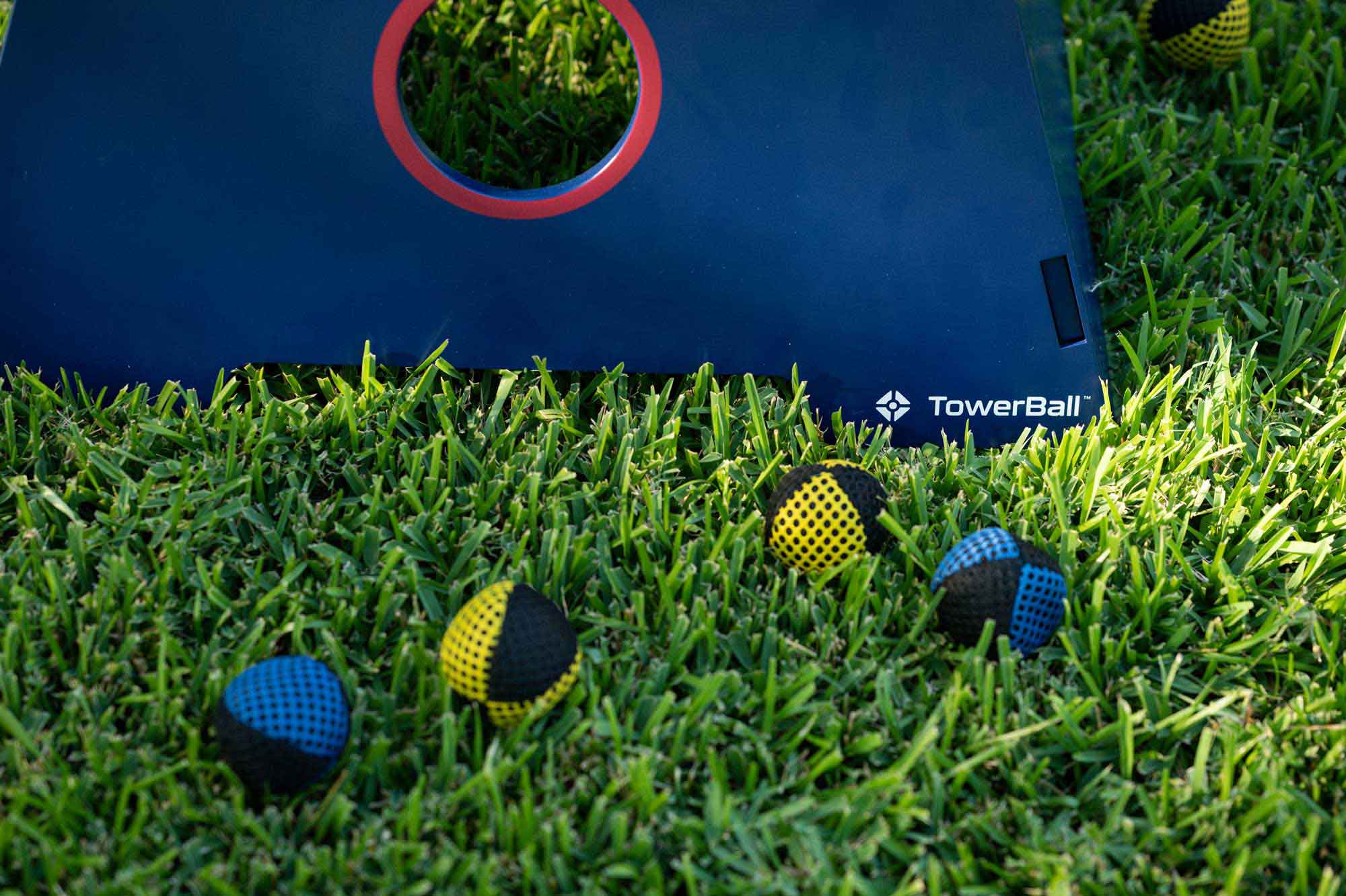 TowerBall backyard game with balls in grass