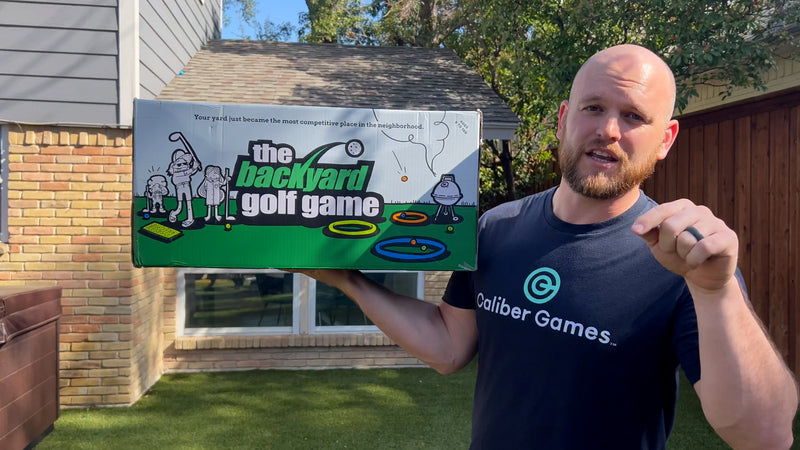 Man in backyard with The Backyard Golf Game talking about games rating, pointing at camera.