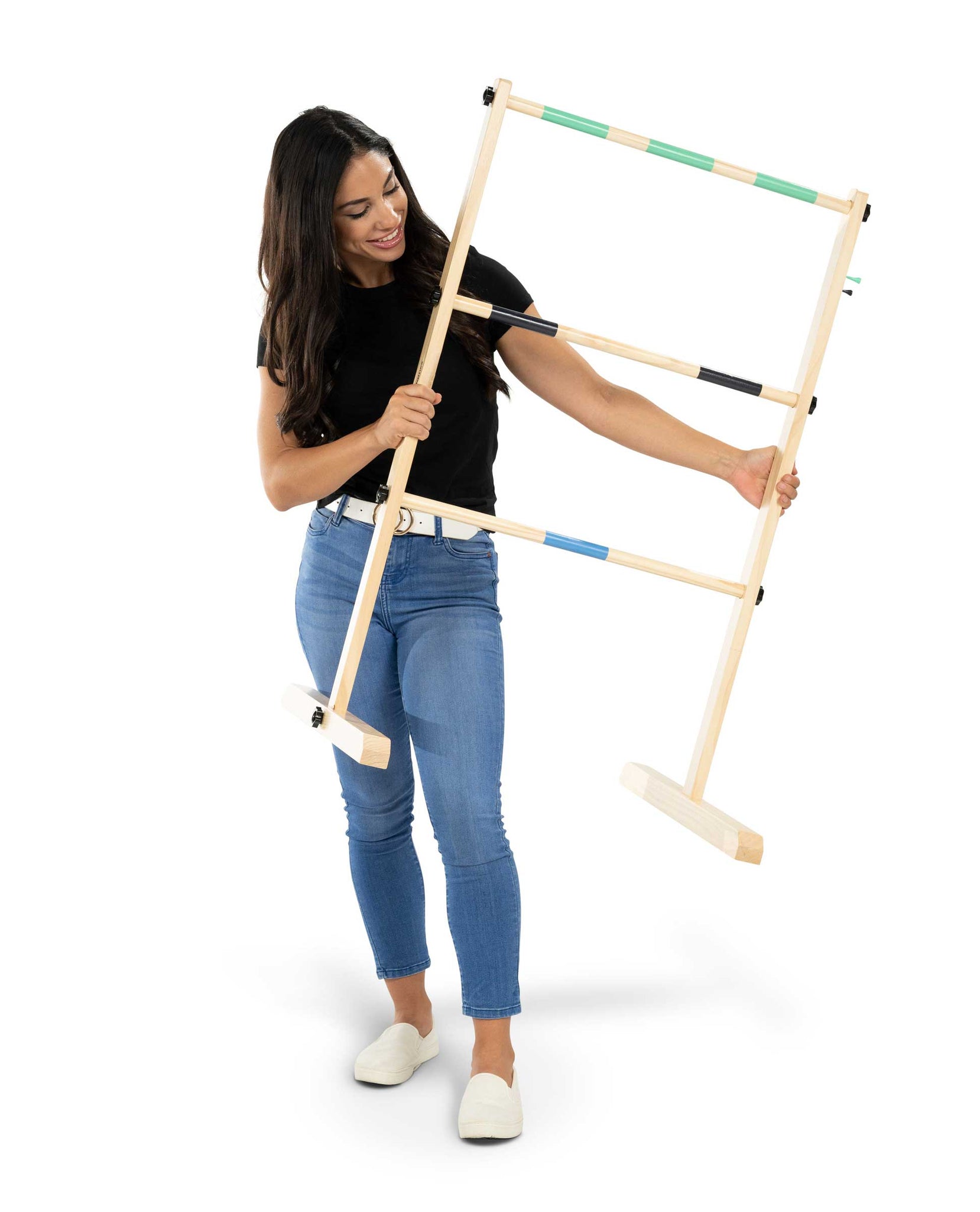 Woman holding ladder toss frame - Caliber Games